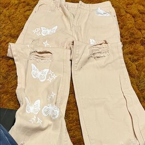 Beige Jeans with White Butterfly Design